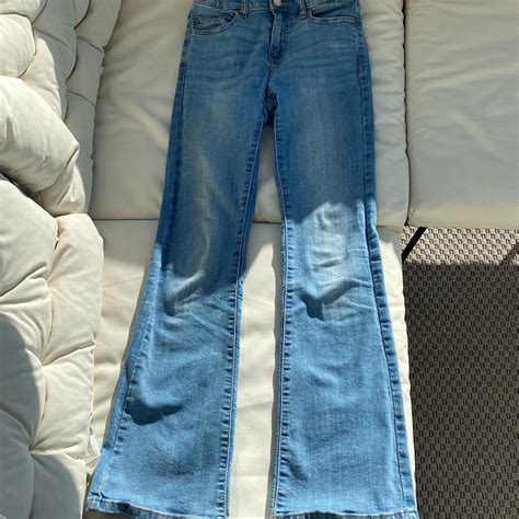 köpa en storlek mindre jeans